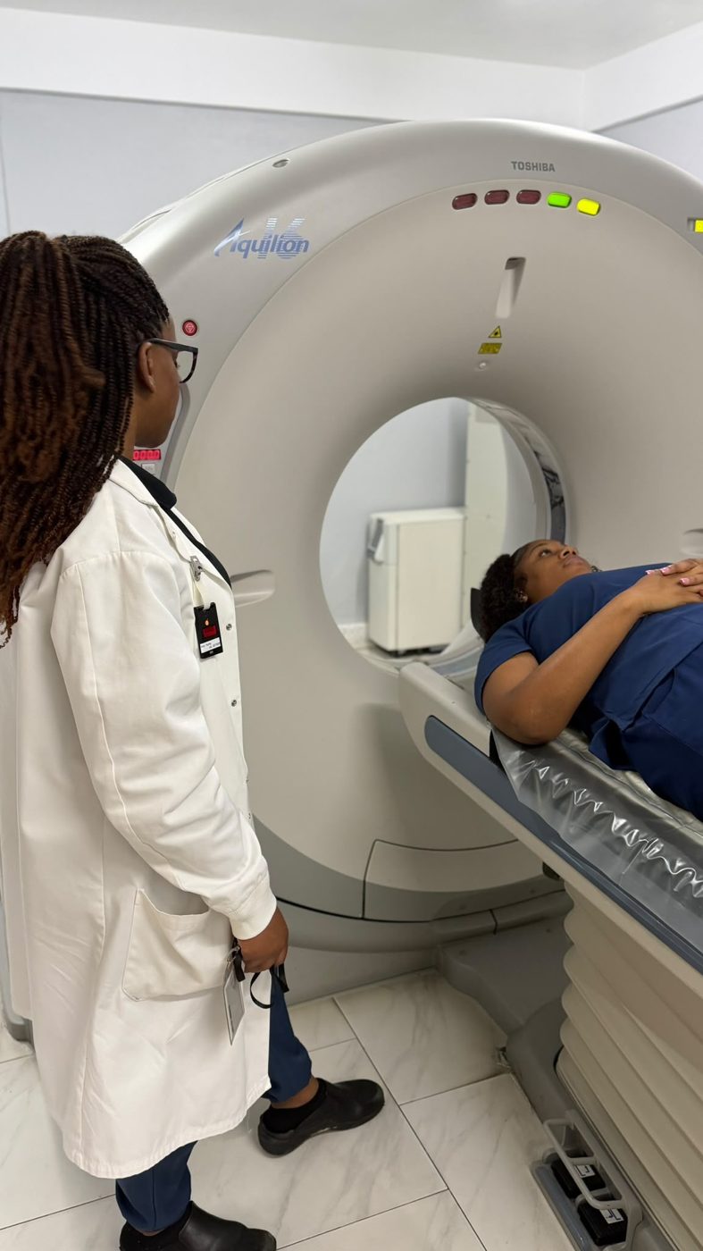 Ms. Rapha, Radiologic Technologist, preparing a patient on our CT scanner