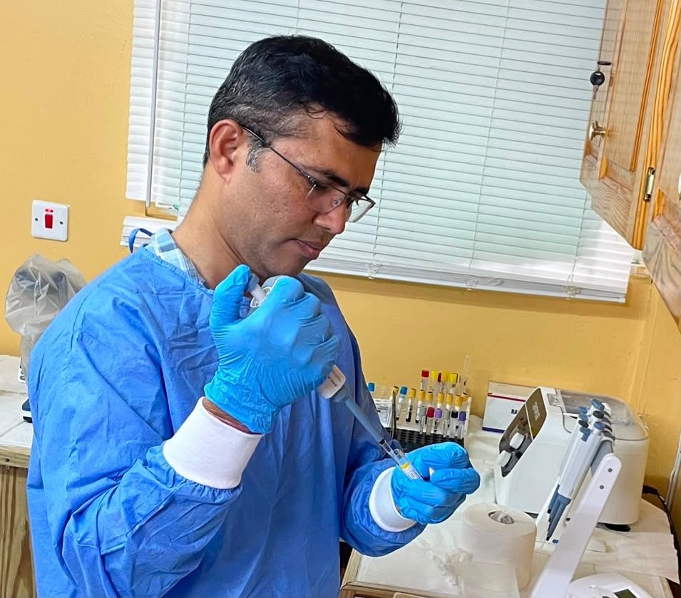 Mr. R. Gajula, Clinical Laboratory Technologist, preparing samples